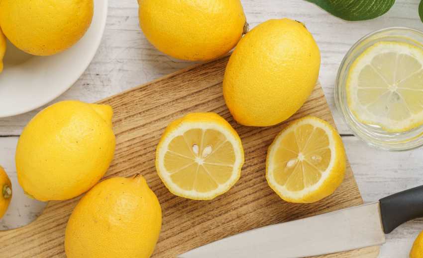 Sliced lemons on a cutting board 